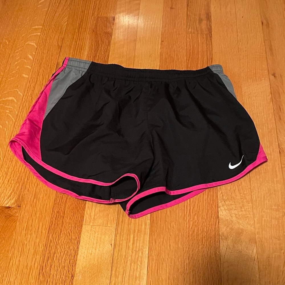 black and pink Nike athletic shorts